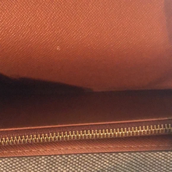 Authentic Louis Vuitton monogram wallet 7.25inLx4inW